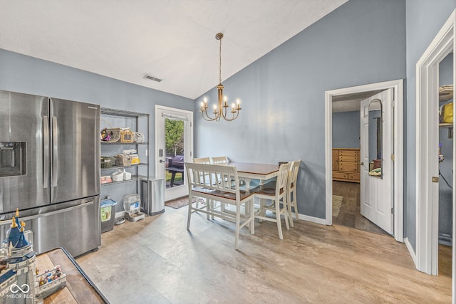3914 Chenango Pl, West Lafayette, IN 47906 - dining area with lofted ceiling, a chandelier, and wood finished floors