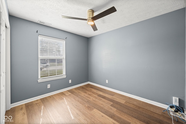 3914 Chenango Pl, West Lafayette, IN 47906 - unfurnished room with ceiling fan, wood finished floors, and a textured ceiling