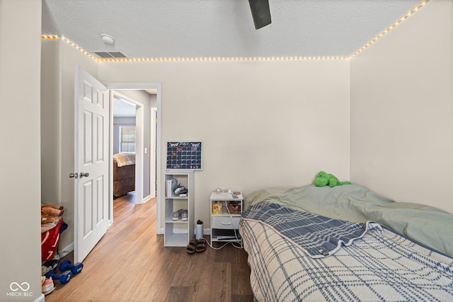 3914 Chenango Pl, West Lafayette, IN 47906 - bedroom featuring wood finished floors and a textured ceiling