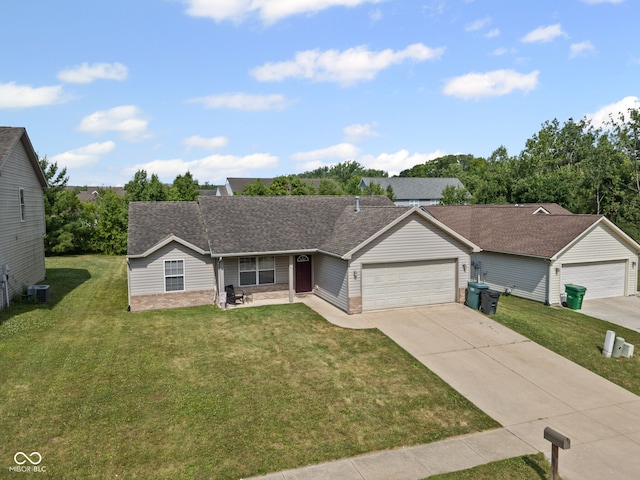 3914 Chenango Pl, West Lafayette, IN 47906 - ranch-style house featuring an attached garage, driveway, a front yard, and a shingled roof