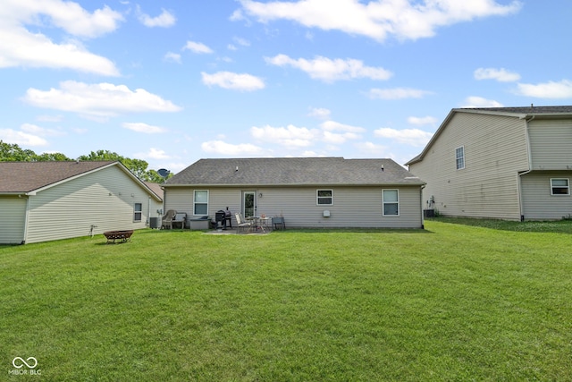 3914 Chenango Pl, West Lafayette, IN 47906 - back of house with a fire pit, a yard, and a patio