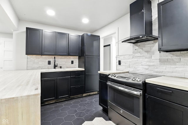 8138 Harrison Dr, Lawrence, IN 46226 - kitchen with electric range, extractor fan, backsplash, light countertops, and recessed lighting