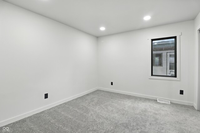 8138 Harrison Dr, Lawrence, IN 46226 - carpeted empty room with baseboards and recessed lighting
