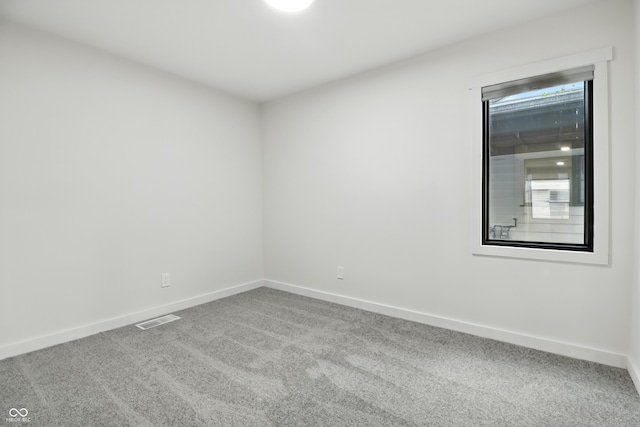 8138 Harrison Dr, Lawrence, IN 46226 - carpeted empty room with baseboards