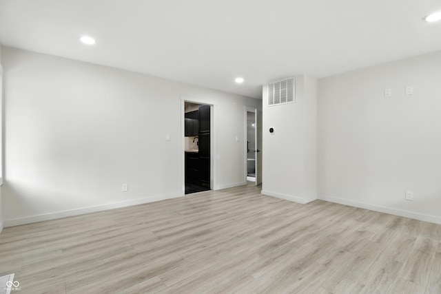 8138 Harrison Dr, Lawrence, IN 46226 - unfurnished room featuring light wood-style floors and recessed lighting