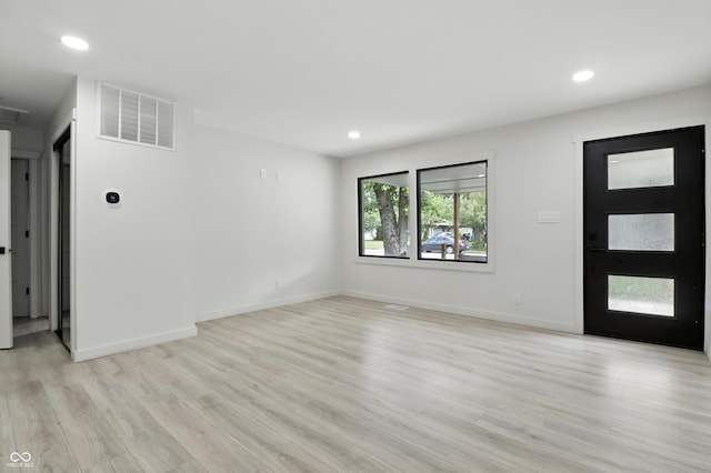 8138 Harrison Dr, Lawrence, IN 46226 - foyer entrance featuring light wood-type flooring and recessed lighting