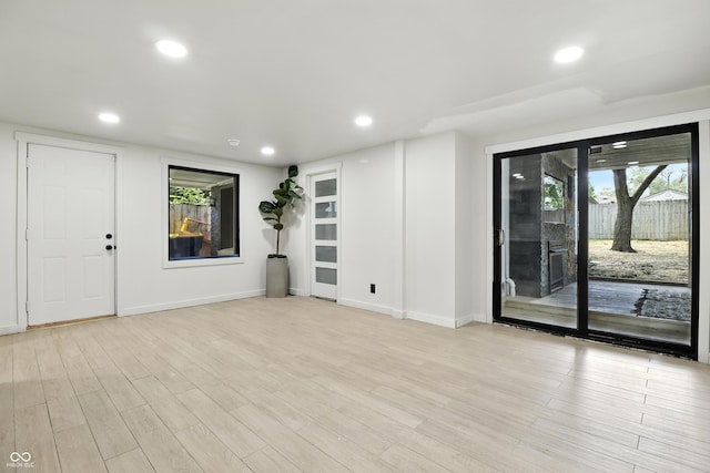 8138 Harrison Dr, Lawrence, IN 46226 - unfurnished room with light wood-style flooring and recessed lighting