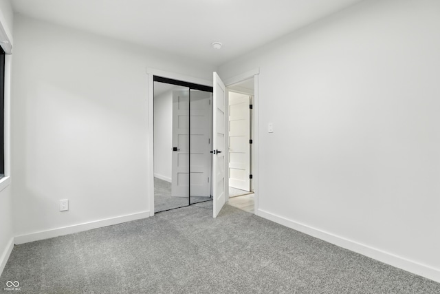 8138 Harrison Dr, Lawrence, IN 46226 - unfurnished bedroom featuring carpet and a closet