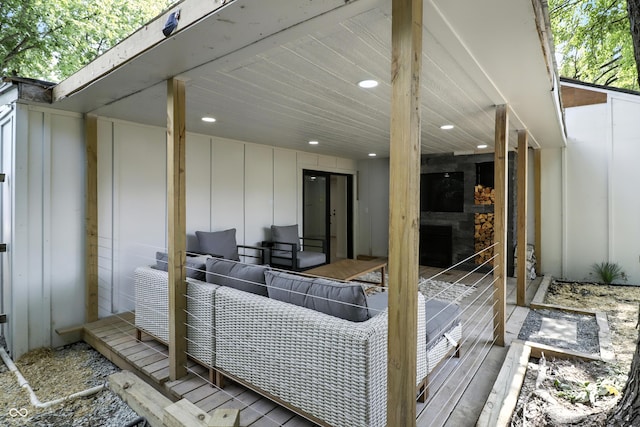 8138 Harrison Dr, Lawrence, IN 46226 - wooden terrace with outdoor lounge area