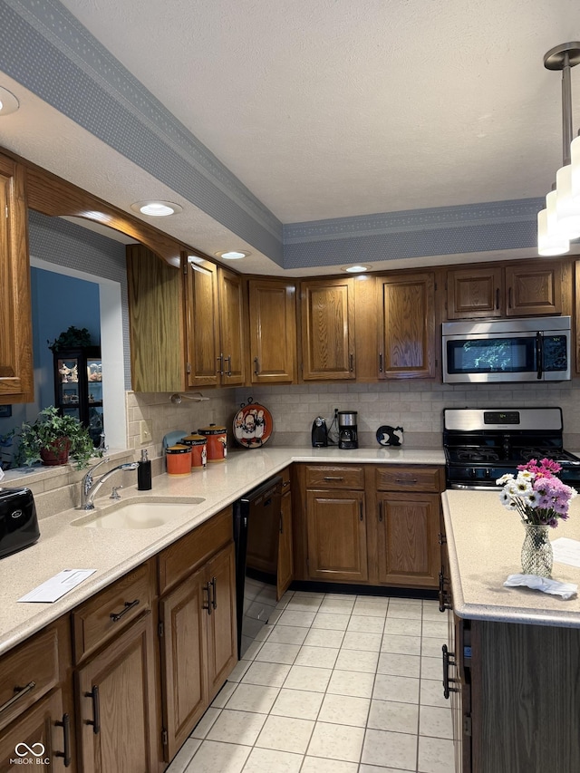 8048 River Bay Dr E, Indianapolis, IN 46240 - kitchen with stainless steel appliances, light countertops, light tile patterned floors, backsplash, and brown cabinets