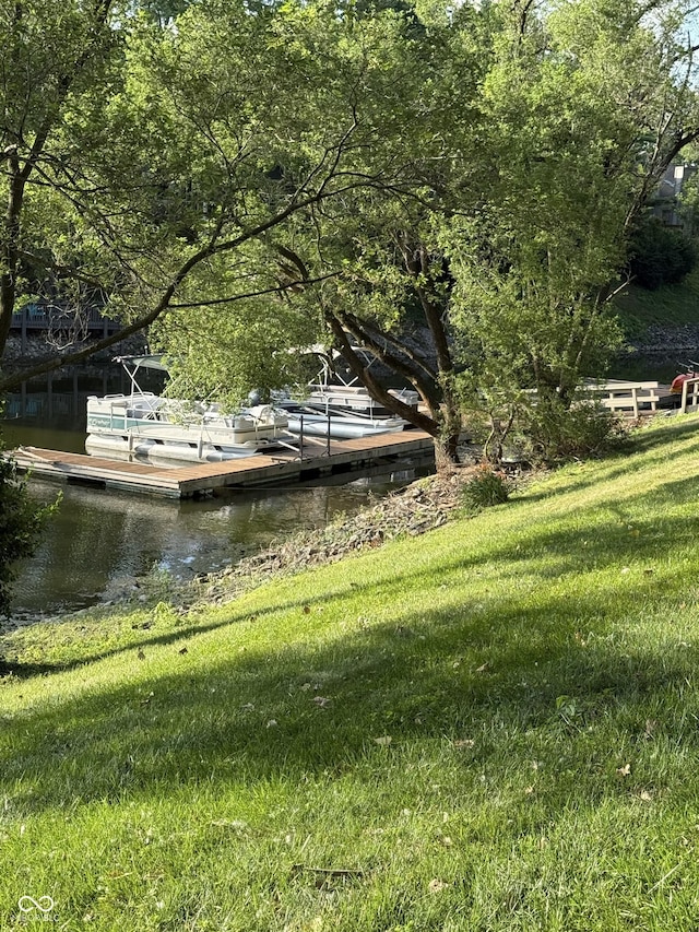 8048 River Bay Dr E, Indianapolis, IN 46240 - dock featuring a yard and a water view