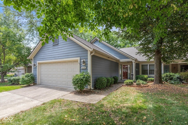 8048 River Bay Dr E, Indianapolis, IN 46240 - ranch-style home with a garage, concrete driveway, a front yard, and roof with shingles