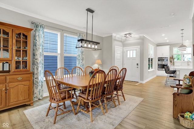 355 Ehrlich Ln, Westfield, IN 46074 - dining room featuring crown molding, light wood-type flooring, and recessed lighting