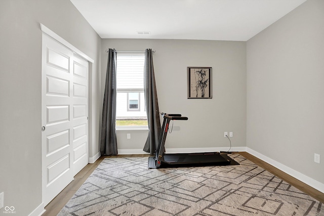 355 Ehrlich Ln, Westfield, IN 46074 - workout area with wood finished floors and baseboards