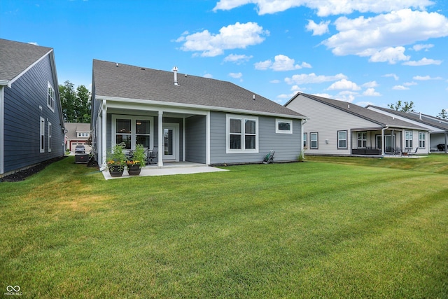 355 Ehrlich Ln, Westfield, IN 46074 - rear view of property with a patio and a lawn