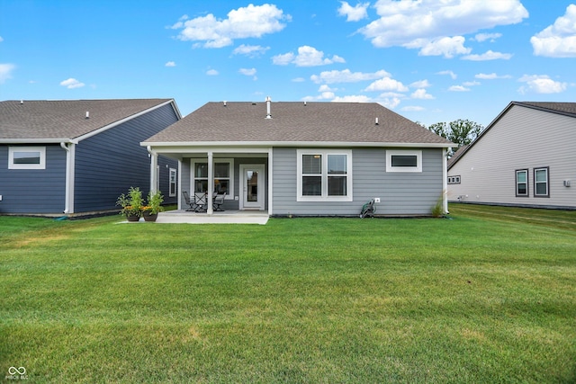355 Ehrlich Ln, Westfield, IN 46074 - rear view of property with a patio area, a yard, and roof with shingles