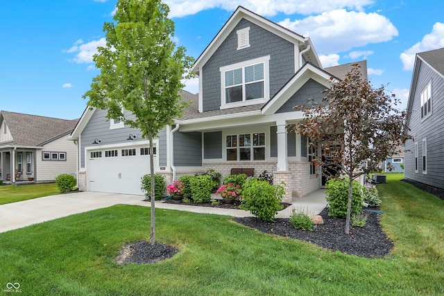 355 Ehrlich Ln, Westfield, IN 46074 - craftsman inspired home featuring a front yard, concrete driveway, an attached garage, and a porch