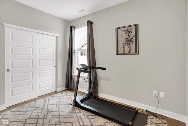 355 Ehrlich Ln, Westfield, IN 46074 - exercise area with baseboards and wood finished floors