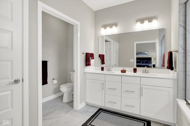 355 Ehrlich Ln, Westfield, IN 46074 - bathroom featuring marble look tiles and double vanity