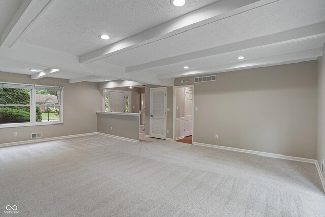10184 Lakeshore Dr E, Carmel, IN 46033 - below grade area featuring light carpet, a textured ceiling, and recessed lighting