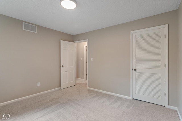 10184 Lakeshore Dr E, Carmel, IN 46033 - unfurnished bedroom featuring carpet and a closet