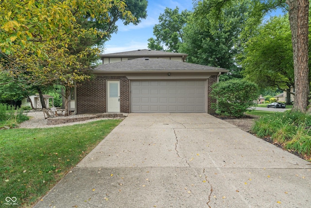 10184 Lakeshore Dr E, Carmel, IN 46033 - traditional-style home featuring driveway, an attached garage, brick siding, a front yard, and roof with shingles