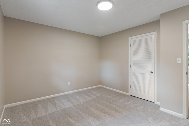 10184 Lakeshore Dr E, Carmel, IN 46033 - unfurnished bedroom featuring carpet and a closet