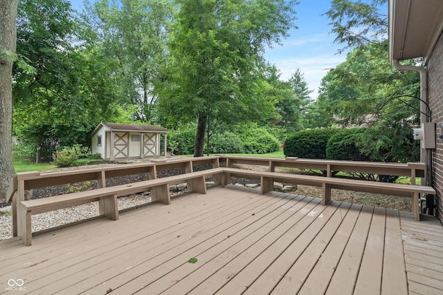 10184 Lakeshore Dr E, Carmel, IN 46033 - wooden terrace with a shed and view of wooded area