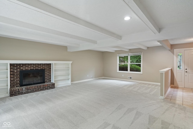 10184 Lakeshore Dr E, Carmel, IN 46033 - unfurnished living room featuring carpet, a textured ceiling, beamed ceiling, a brick fireplace, and recessed lighting