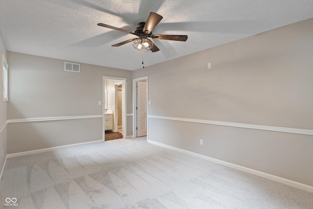 10184 Lakeshore Dr E, Carmel, IN 46033 - unfurnished room with ceiling fan, carpet floors, and a textured ceiling