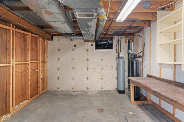 10184 Lakeshore Dr E, Carmel, IN 46033 - unfinished below grade area featuring a water softener system