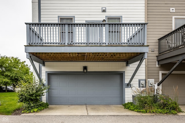 2570 Congress St, Carmel, IN 46032 - back of property with an attached garage and a balcony