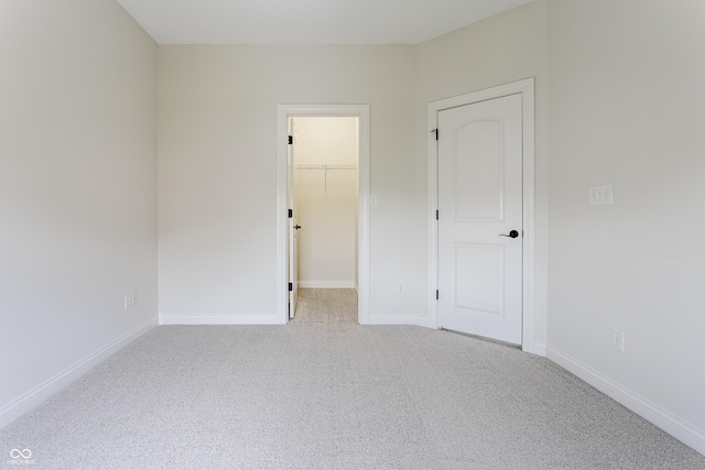 2570 Congress St, Carmel, IN 46032 - unfurnished bedroom featuring carpet floors and a spacious closet