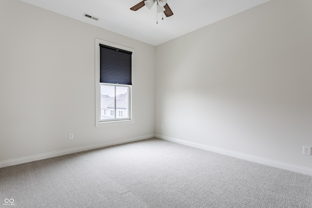 2570 Congress St, Carmel, IN 46032 - spare room with carpet floors and ceiling fan