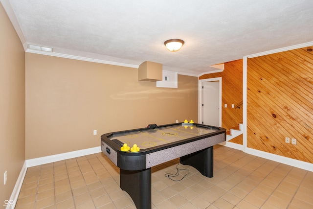 3750 S Whitehorse Rd, Nashville, IN 47448 - playroom with wood walls, ornamental molding, and light tile patterned flooring