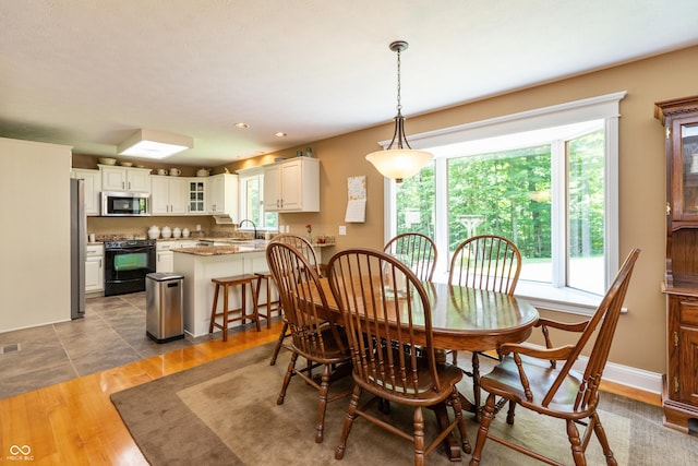 3750 S Whitehorse Rd, Nashville, IN 47448 - dining area with light wood finished floors and recessed lighting