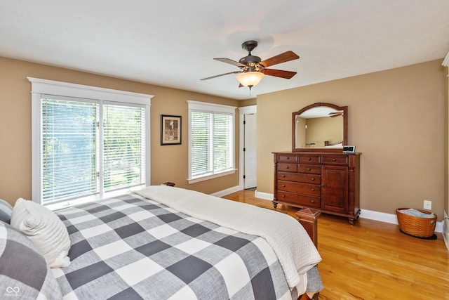 3750 S Whitehorse Rd, Nashville, IN 47448 - bedroom with light wood-style flooring and a ceiling fan
