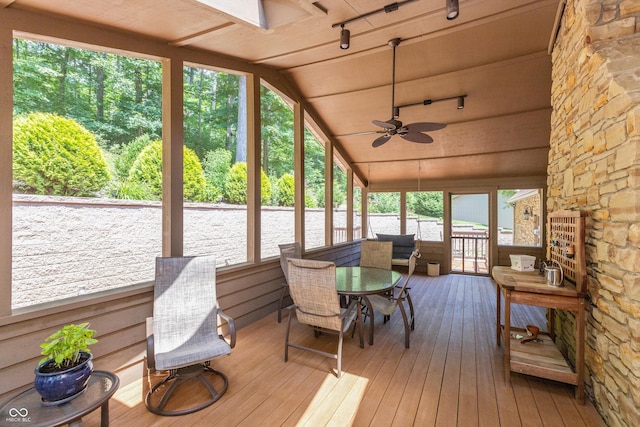 3750 S Whitehorse Rd, Nashville, IN 47448 - sunroom / solarium with a ceiling fan, plenty of natural light, lofted ceiling, and outdoor dining space