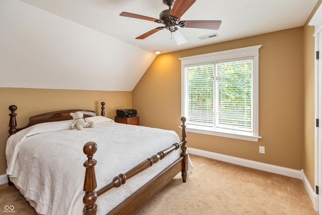 3750 S Whitehorse Rd, Nashville, IN 47448 - bedroom with light colored carpet, ceiling fan, and vaulted ceiling