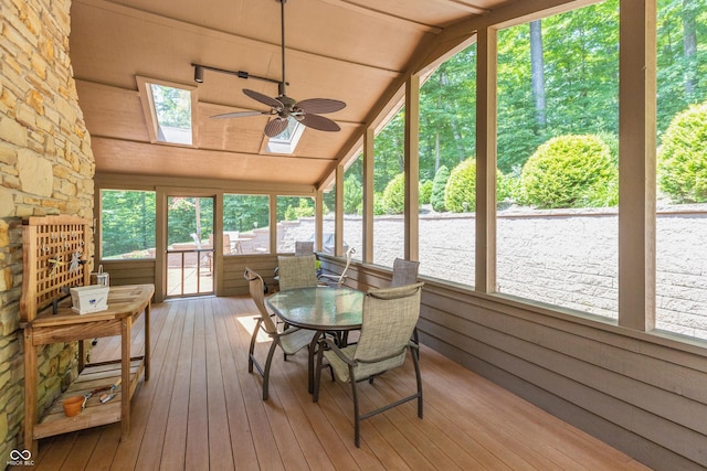 3750 S Whitehorse Rd, Nashville, IN 47448 - sunroom / solarium with lofted ceiling, ceiling fan, hardwood / wood-style flooring, outdoor dining space, and a skylight