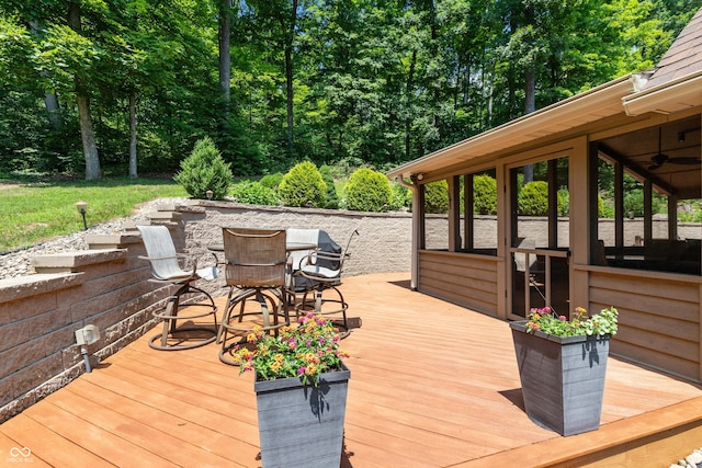 3750 S Whitehorse Rd, Nashville, IN 47448 - wooden terrace featuring outdoor dining space and ceiling fan