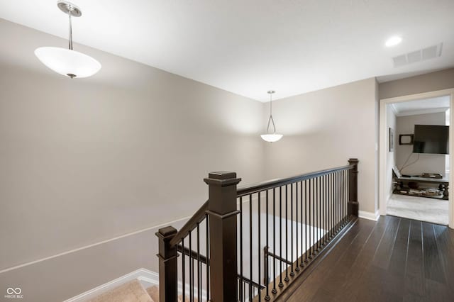 869 N Park Trail Dr, Carmel, IN 46032 - hall featuring an upstairs landing and dark wood-style flooring