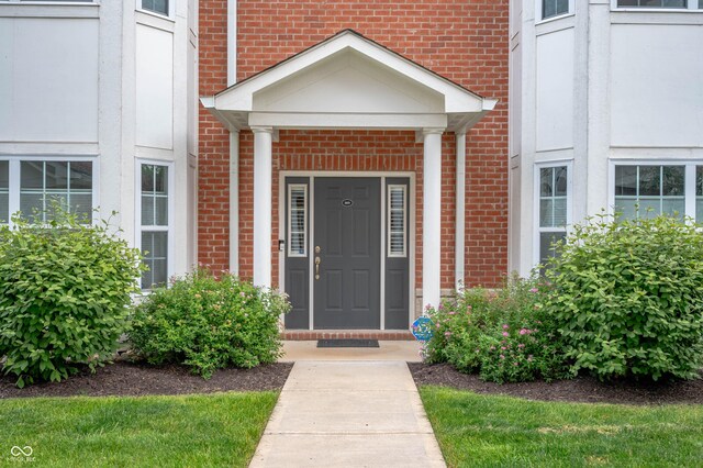 869 N Park Trail Dr, Carmel, IN 46032 - doorway to property with brick siding