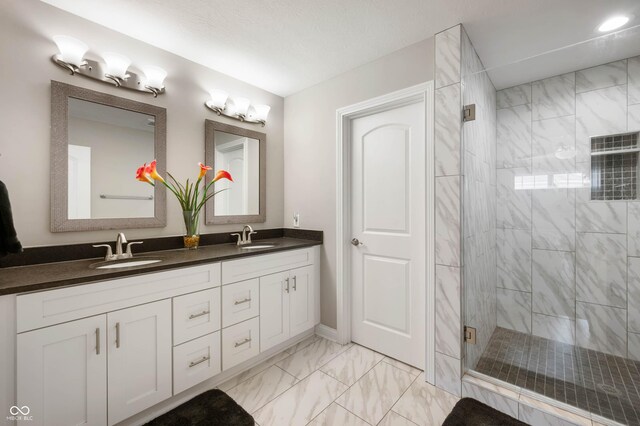 869 N Park Trail Dr, Carmel, IN 46032 - full bathroom with double vanity, a stall shower, and marble finish floors