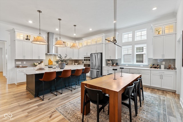 1275 Stonehaven Dr, Westfield, IN 46074 - dining area featuring crown molding, light wood finished floors, and recessed lighting