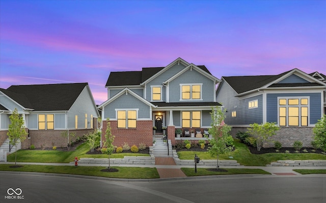 1275 Stonehaven Dr, Westfield, IN 46074 - craftsman house with a porch and brick siding