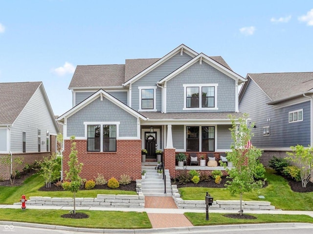 1275 Stonehaven Dr, Westfield, IN 46074 - craftsman-style house with a porch and brick siding
