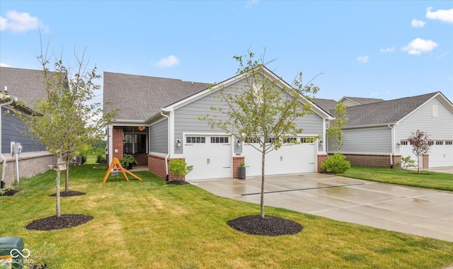 1275 Stonehaven Dr, Westfield, IN 46074 - view of front of property with a garage, driveway, brick siding, and a front yard