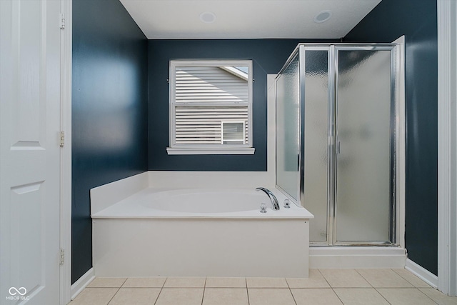 13722 Wendessa Dr, Fishers, IN 46038 - bathroom with a stall shower, a garden tub, and tile patterned flooring