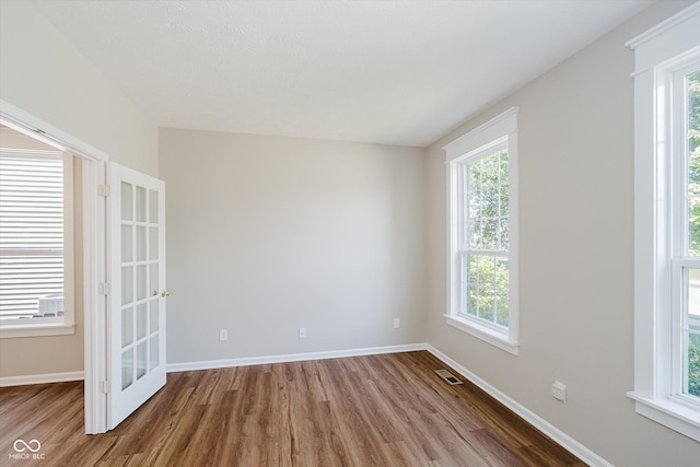 13722 Wendessa Dr, Fishers, IN 46038 - empty room featuring wood finished floors and healthy amount of natural light